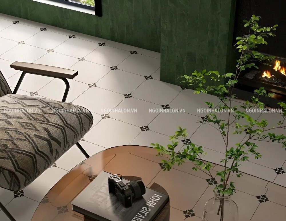 Gạch bông trắng lát nền phòng khách kết hợp sơn tường xanh lá mang vẻ đẹp tràn đầy sức sống.