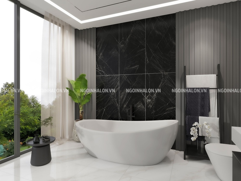 Không gian nhà tắm có chiều sâu và thu hút hơn khi ốp gạch 60x120 màu đen vân đá kết hợp nội thất sáng màu.